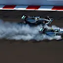 Nico Rosberg (GER) Mercedes AMG F1 W05 locks up inside Lewis Hamilton (GBR) Mercedes AMG F1 W05 at the start of the race. Formula One World Championship, Rd16, Russian Grand Prix, Race, Sochi Autodrom, Sochi, Krasnodar Krai, Russia, Sunday, 12 October 2014