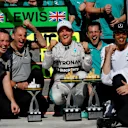 Race winner Nico Rosberg (GER) Mercedes AMG F1 celebrates with second placed Lewis Hamilton (GBR) Mercedes AMG F1, Toto Wolff (AUT) Mercedes AMG F1 Director of Motorsport and the team. Formula One World Championship, Rd18, Brazilian Grand Prix, Race, Sao Paulo, Brazil, Sunday, 9 November 2014