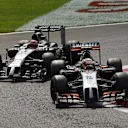Sergio Perez (MEX) Force India VJM07 leads Jenson Button (GBR) McLaren MP4-29. Formula One World Championship, Rd13, Italian Grand Prix, Monza, Italy, Race Day, Sunday, 7 September 2014