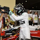 Pole sitter Nico Rosberg (GER) Mercedes AMG F1 celebrates in parc ferme. Formula One World Championship, Rd19, Abu Dhabi Grand Prix, Qualifying, Yas Marina Circuit, Abu Dhabi, UAE, Saturday, 22 November 2014