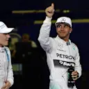 Lewis Hamilton (GBR) Mercedes AMG F1 celebrates his second place in qualifying in parc ferme. Valtteri Bottas (FIN) Williams Martini Racing, left, was third. Formula One World Championship, Rd19, Abu Dhabi Grand Prix, Qualifying, Yas Marina Circuit, Abu Dhabi, UAE, Saturday, 22 November 2014