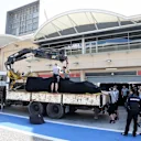 The car of Nico Rosberg (GER) Mercedes AMG F1 is returned to the pits on a truck. Formula One Testing, Day Two, Bahrain International Circuit, Sakhir, Bahrain, Thursday, 20 February 2014