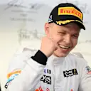 Kevin Magnussen (DEN) McLaren celebrates third place on the podium. Formula One World Championship, Rd1, Australian Grand Prix, Race, Albert Park, Melbourne, Australia, Sunday, 16 March 2014