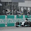 Race winner Lewis Hamilton (GBR) Mercedes AMG F1 W05 crosses the line. Formula One World Championship, Rd2, Malaysian Grand Prix, Race, Sepang, Malaysia, Sunday, 30 March 2014