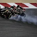 Romain Grosjean (FRA) Lotus E22 locks up. Formula One World Championship, Rd3, Bahrain Grand Prix, Practice, Bahrain International Circuit, Sakhir, Bahrain, Friday, 4 April 2014