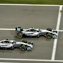 Lewis Hamilton (GBR) Mercedes AMG F1 W05 and Nico Rosberg (GER) Mercedes AMG F1 W05 battle. Formula One World Championship, Rd3, Bahrain Grand Prix, Race, Bahrain International Circuit, Sakhir, Bahrain, Sunday, 6 April 2014