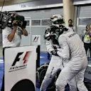 Race winner Lewis Hamilton (GBR) Mercedes AMG F1 celebrates in parc ferme with Nico Rosberg (GER) Mercedes AMG F1. Formula One World Championship, Rd3, Bahrain Grand Prix, Race, Bahrain International Circuit, Sakhir, Bahrain, Sunday, 6 April 2014