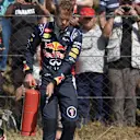 Sebastian Vettel (GER) Red Bull Racing RB10 stops on track in the first practice session with fire extinguisher. Formula One World Championship, Rd5, Spanish Grand Prix, Practice, Barcelona, Spain, Friday, 9 May 2014