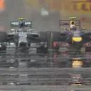 Daniel Ricciardo, DRS wide open on his Red Bull, pulls out from the slipstream of Nico Rosberg's Mercedes to grab the lead of the race. © FOWC Ltd