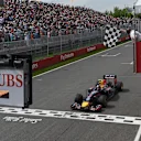 Race winner Daniel Ricciardo (AUS) Red Bull Racing RB10 crosses the line to take the chequered flag. Formula One World Championship, Rd7, Canadian Grand Prix, Race Day, Montreal, Canada, Sunday, 8 June 2014