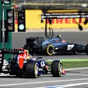 Sebastian Vettel (GER) Red Bull Racing RB10 and Kevin Magnussen (DEN) McLaren MP4-29. Formula One World Championship, Rd10, German Grand Prix, Practice, Hockenheim, Germany, Friday, 18 July 2014