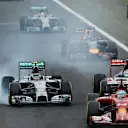 Nico Rosberg (GER) Mercedes AMG F1 W05 locks up and battles with Jean-Eric Vergne (FRA) Scuderia Toro Rosso STR9. Formula One World Championship, Rd11, Hungarian Grand Prix, Race Day, Hungaroring, Hungary. Sunday, 27 July 2014