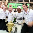 (L to R): Andy Cowell (GBR) Managing Director, Mercedes AMG High Performance Powertrains in the Press Conference, Paddy Lowe (GBR) Mercedes AMG F1 Executive Director (Technical), race winner Lewis Hamilton (GBR) Mercedes AMG F1 and Toto Wolff (AUT) Mercedes AMG F1 Director of Motorsport celebrate with the trophy. Formula One World Championship, Rd9, British Grand Prix, Race Day, Silverstone, England, Sunday, 6 July 2014
