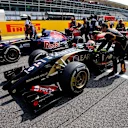 Pastor Maldonado (VEN) Lotus E22 and Jean-Eric Vergne (FRA) Scuderia Toro Rosso STR9 on the grid. Formula One World Championship, Rd13, Italian Grand Prix, Monza, Italy, Race Day, Sunday, 7 September 2014