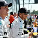 Pole sitter Lewis Hamilton (GBR) Mercedes AMG F1 and Nico Rosberg (GER) Mercedes AMG F1 celebrate in parc ferme. Formula One World Championship, Rd13, Italian Grand Prix, Monza, Italy, Qualifying, Saturday, 6 September 2014