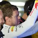 Sebastian Vettel (GER) Red Bull Racing and Christian Horner (GBR) Red Bull Racing Team Principal. Formula One World Championship, Rd13, Italian Grand Prix, Monza, Italy, Qualifying, Saturday, 6 September 2014