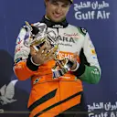 Sergio Perez (MEX) Force India celebrates on the podium. Formula One World Championship, Rd3, Bahrain Grand Prix, Race, Bahrain International Circuit, Sakhir, Bahrain, Sunday, 6 April 2014