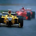 Race winner Damon Hill (GBR) Jordan 198 holds off Michael Schumacher (GER) Ferrari F300 early in the race.  
Formula One World Championship, Rd 13, Belgian Grand Prix, Spa Francorchamps, Belgium, 30 August 1998

