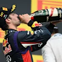 Race winner Daniel Ricciardo (AUS) Red Bull Racing celebrates on the podium with the champagne. Formula One World Championship, Rd11, Hungarian Grand Prix, Race Day, Hungaroring, Hungary. Sunday, 27 July 2014