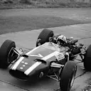 Nurburgring, August 1966: John Surtees in the Cooper T81-Maserati on his way to second place and fastest lap in the German Grand Prix. He went on to take his only victory for the team at the season finale in Mexico. © Schlegelmilch © No reproduction without permission.