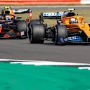 Formula One F1 - 70th Anniversary Grand Prix - Silverstone Circuit, Silverstone, Britain - August 9, 2020 McLaren's Lando Norris and Red Bull's Alexander Albon in action during the race Pool via REUTERS/Andrew Boyers