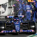 Alpine's Spanish driver Fernando Alonso leaves the pit after a tyre change during the 2022 Formula One Australian Grand Prix at the Albert Park Circuit in Melbourne on April 10, 2022.