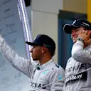 (L to R): Lewis Hamilton (GBR) Mercedes AMG F1 and race winner Nico Rosberg (GER) Mercedes AMG F1 on the podium.
Formula One World Championship, Rd8, Austrian Grand Prix, Race, Spielberg, Austria, Sunday 22 June 2014.
