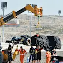 The car of Pastor Maldonado (VEN) Lotus E22 is recovered, Formula One Testing, Day Three, Bahrain International Circuit, Sakhir, Bahrain, Friday, 21 February 2014 © Sutton Images. No reproduction without permission