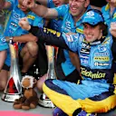 Fernando Alonso (ESP) Renault celebrates his victory with the team.
Formula One World Championship, Rd 1, Bahrain Grand Prix, Race, Bahrain International Circuit, Bahrain, 12 March 2006.