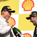 Valtteri Bottas (FIN) Williams and Daniel Ricciardo (AUS) Red Bull Racing celebrates on the podium with the champagne.
Formula One World Championship, Rd12, Belgian Grand Prix, Race Day, Spa-Francorchamps, Belgium, Sunday 24 August 2014. © Sutton Motorsport Images