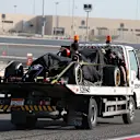 Romain Grosjean (FRA) Lotus E22 stops on track and is recovered. Formula One Testing, Day Three, Bahrain International Circuit, Sakhir, Bahrain, Saturday, 1 March 2014 © Sutton Images. No reproduction without permission