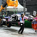 SINGAPORE, SINGAPORE - SEPTEMBER 22: The car of Sergio Perez of Mexico and Racing Point is removed from the circuit after he retired during the F1 Grand Prix of Singapore at Marina Bay Street Circuit on September 22, 2019 in Singapore. (Photo by Clive Mason/Getty Images)