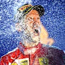 SINGAPORE, SINGAPORE - SEPTEMBER 22: Race winner Sebastian Vettel of Germany and Ferrari celebrates on the podium during the F1 Grand Prix of Singapore at Marina Bay Street Circuit on September 22, 2019 in Singapore. (Photo by Clive Mason/Getty Images)