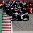 AUSTIN, TEXAS - NOVEMBER 03: Valtteri Bottas driving the (77) Mercedes AMG Petronas F1 Team Mercedes W10 leads Max Verstappen of the Netherlands driving the (33) Aston Martin Red Bull Racing RB15 and the rest of the field into turn two at the start during the F1 Grand Prix of USA at Circuit of The Americas on November 03, 2019 in Austin, Texas. (Photo by Dan Istitene/Getty Images)