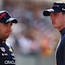 LE CASTELLET, FRANCE - JULY 23: Second placed qualifier Max Verstappen of the Netherlands and Oracle Red Bull Racing and Third placed qualifier Sergio Perez of Mexico and Oracle Red Bull Racing talk in parc ferme during qualifying ahead of the F1 Grand Prix of France at Circuit Paul Ricard on July 23, 2022 in Le Castellet, France. (Photo by Mark Thompson/Getty Images)