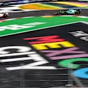MEXICO CITY, MEXICO - OCTOBER 29: Kevin Magnussen of Denmark and Haas and Lance Stroll of Aston Martin and Canada  during qualifying ahead of the F1 Grand Prix of Mexico at Autodromo Hermanos Rodriguez on October 29, 2022 in Mexico City, Mexico. (Photo by Peter J Fox/Getty Images )