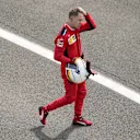 German Formula One driver Sebastian Vettel of Scuderia Ferrari reacts after the 2020 Formula One Grand Prix of Great Britain at the Silverstone Circuit, in Northamptonshire, Britain, 2 August 2020.
