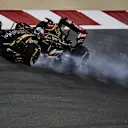 Romain Grosjean (FRA) Lotus E22 locks up. Formula One World Championship, Rd3, Bahrain Grand Prix, Practice, Bahrain International Circuit, Sakhir, Bahrain, Friday, 4 April 2014