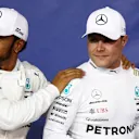 YAS MARINA CIRCUIT, UNITED ARAB EMIRATES - NOVEMBER 24: Lewis Hamilton, Mercedes AMG F1, with Valtteri Bottas, Mercedes AMG F1 during the Abu Dhabi GP at Yas Marina Circuit on November 24, 2018 in Yas Marina Circuit, United Arab Emirates. (Photo by Glenn Dunbar / LAT Images)
