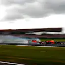 SILVERSTONE, UNITED KINGDOM - JULY 14: Sebastian Vettel, Ferrari locks up and runs into the back of Max Verstappen, Red Bull Racing RB15 during the British GP at Silverstone on July 14, 2019 in Silverstone, United Kingdom. (Photo by Zak Mauger / LAT Images)