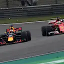 Sebastian Vettel (GER) Ferrari SF70-H and Daniel Ricciardo (AUS) Red Bull Racing RB13 battle at Formula One World Championship, Rd2, Chinese Grand Prix, Race, Shanghai, China, Sunday 9 April 2017. © Sutton Motorsport Images
