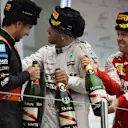 Sergio Perez (MEX) Force India, race winner Lewis Hamilton (GBR) Mercedes AMG F1 and Sebastian Vettel (GER) Ferrari celebrate on the podium with he champagne at Formula One World Championship, Rd15, Russian Grand Prix, Race, Sochi Autodrom, Sochi, Krasnodar Krai, Russia, Sunday 11 October 2015. © Sutton Motorsport Images