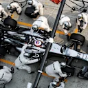 Jenson Button (GBR) McLaren MP4-29 makes a pit stop. Formula One World Championship, Rd2, Malaysian Grand Prix, Race, Sepang, Malaysia, Sunday, 30 March 2014. © Sutton Images