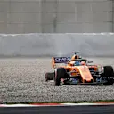 Fernando Alonso (ESP) McLaren MCL33 in the gravel with missing rear wheel at Formula One Testing, Day One, Barcelona, Spain, 26 February 2018. © Sutton Images