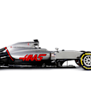Powered by a Ferrari engine, the dark grey, light grey and red-toned colour scheme was inspired by Haas Automation's machine tools. Team Principal Guenther Steiner had previously managed Jaguar and worked at Red Bull before joining Haas.