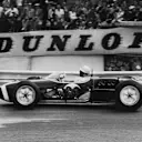 The side panels on Moss's Lotus were reportedly removed for cooling.