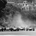 On pole in the left is Moss's privately entered Lotus 18, while Jim Clark (R) had a brand-new factory Lotus 21.