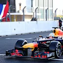 Former F1 racer Jan Lammers waves Verstappen on his way