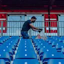 Vettel spent hours after the British Grand Prix on Sunday night picking up litter. Images courtesy of Aston Martin