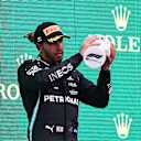BUDAPEST, HUNGARY - AUGUST 01: Third placed Lewis Hamilton of Great Britain and Mercedes GP celebrates on the podium during the F1 Grand Prix of Hungary at Hungaroring on August 01, 2021 in Budapest, Hungary. (Photo by Lars Baron/Getty Images)